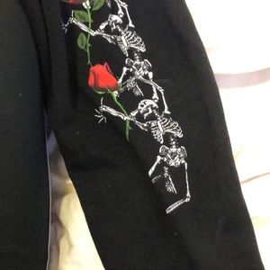 Little bleach spot on button right sleeve